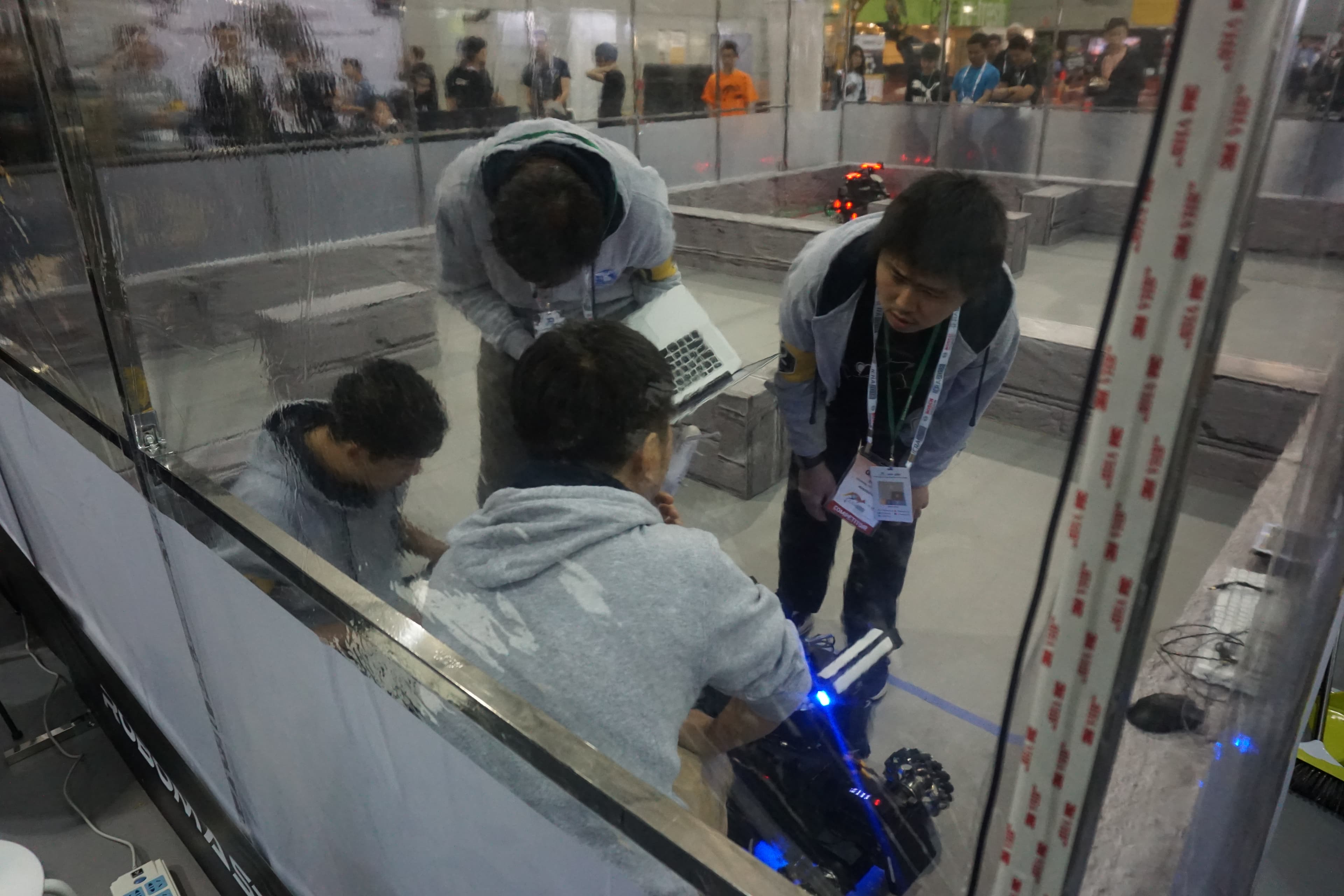 Ausdroid’s robot and team inside the competition field