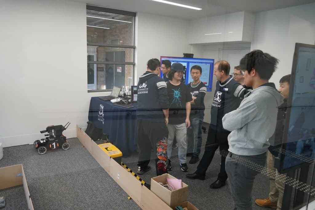 Visitors gathered beside Ausdroid’s robot demonstration at Open Day 2019