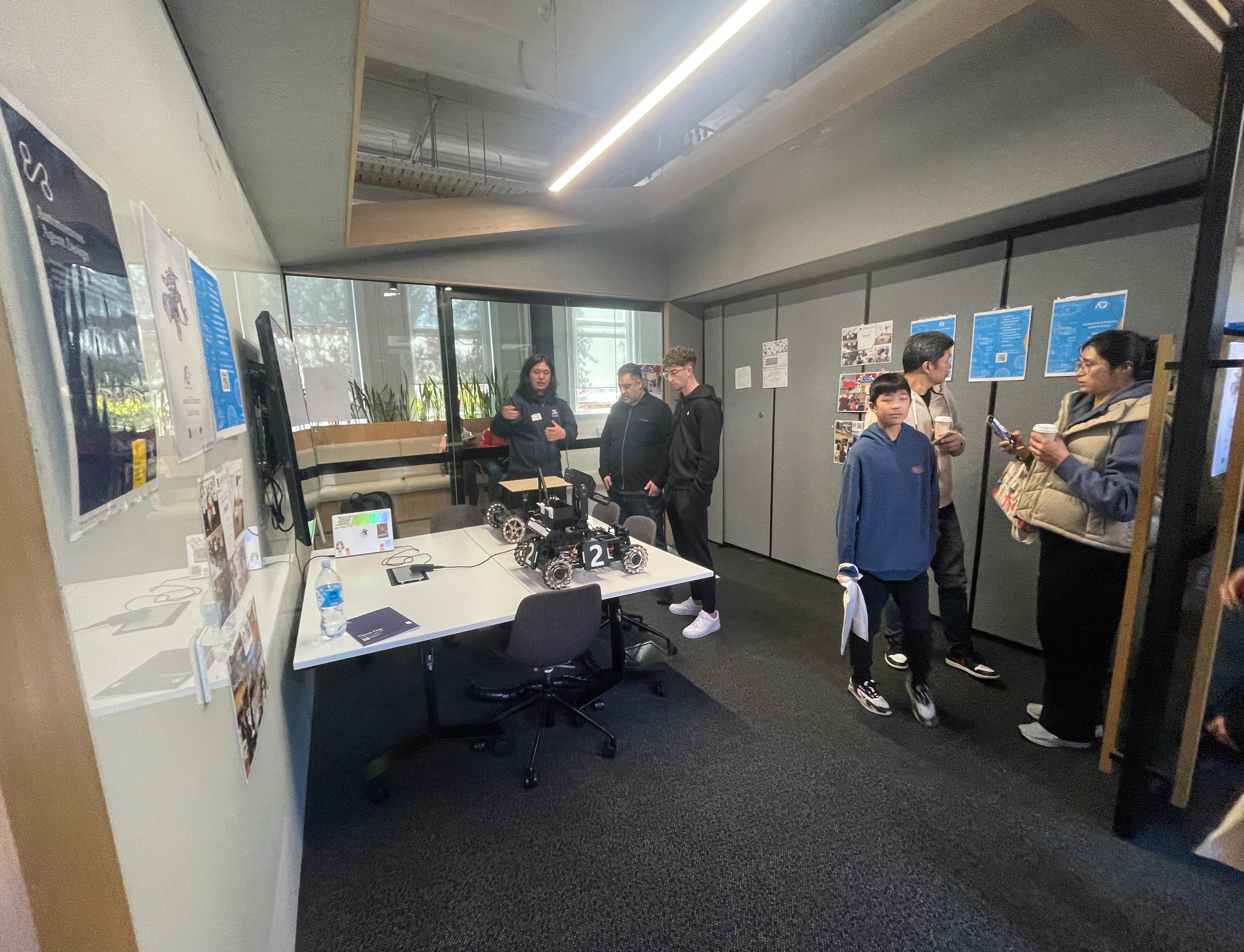 Visitors exploring Ausdroid’s robot display at Melbourne Open Day 2025